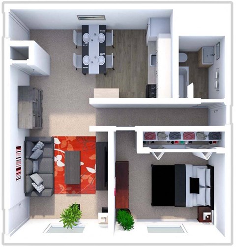 a bedroom with a bed and a desk in a room